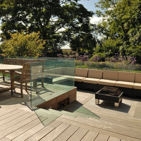 Fire up the fire pit and gather around with wine and nibbles