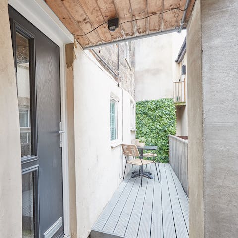 Make the most of your small outdoor space with coffee on the deck