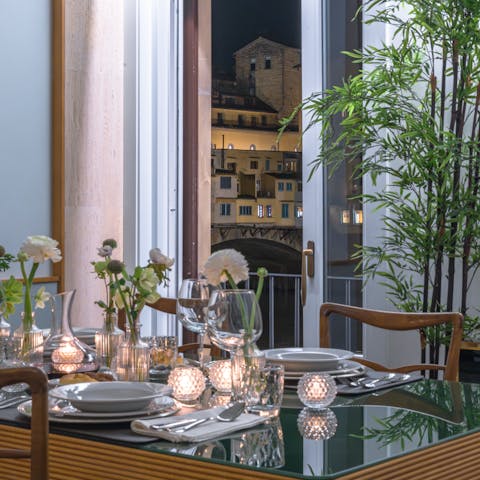 Dine with a background of Florence's twinkling lights
