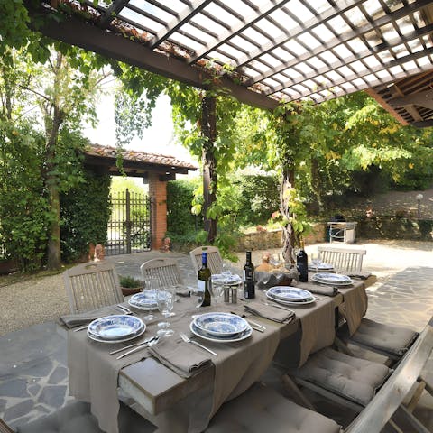 Gather on the covered terrace for alfresco feasts on summer evenings