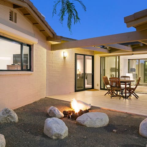 Gather your ensemble around the fire pit as the sun goes down