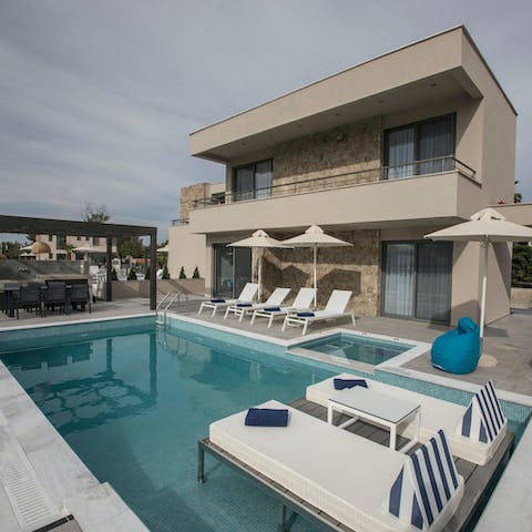 Soak up the Greek sun from in or beside the private pool