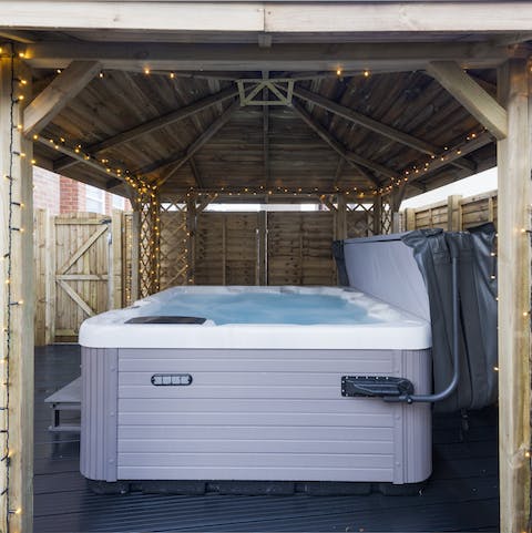 Unwind in the gazebo-covered hot tub