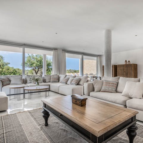 Admire the views from the floor-to-ceiling windows