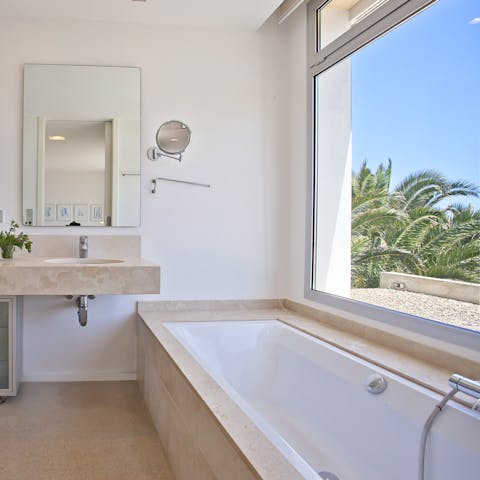 Unwind in the bath tub after a day of exploring the island