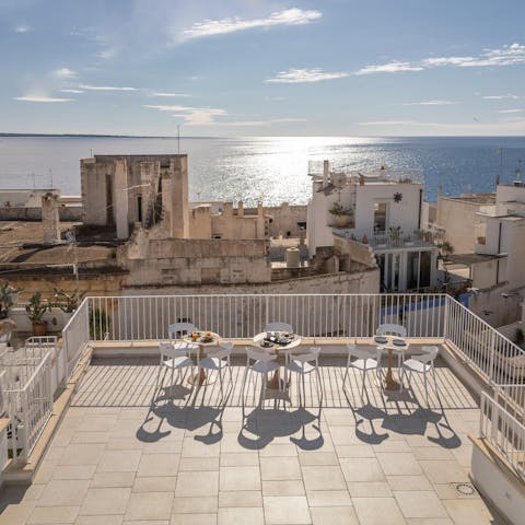 Enjoy the breakfast provided and the sea vistas on the communal roof terrace
