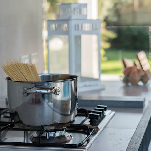 Cook up a feast under the sun with the outdoor kitchen and barbecue