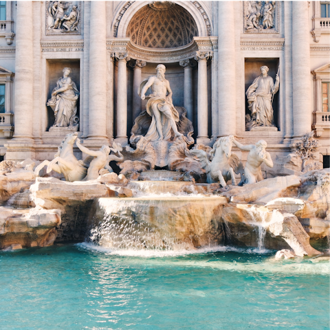 Admire the Trevi Fountain, a seven-minute walk from your door