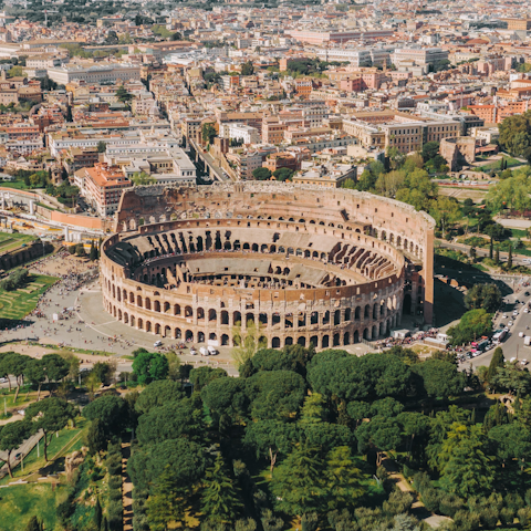 Visit the Colosseum, a fifteen-minute walk away