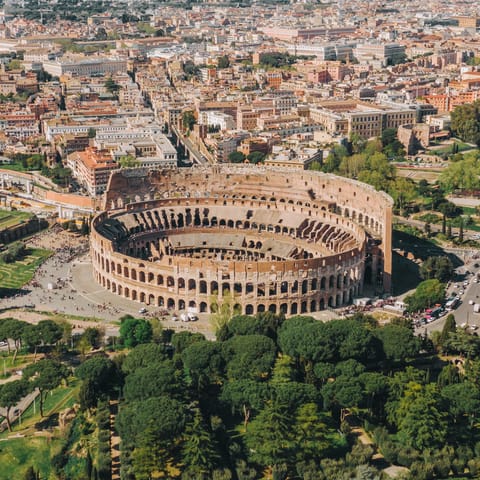 Visit the Colosseum, a fifteen-minute walk away