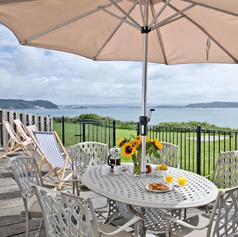 Dine al fresco while looking for seals in the water