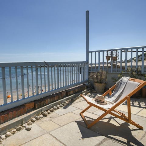 Relax on the terrace or wander down to the beach