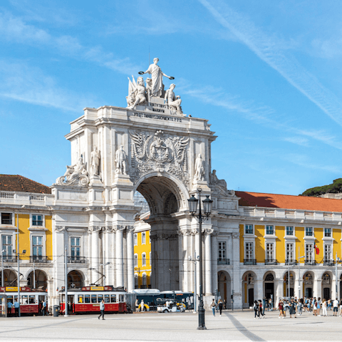 Wander through the atmospheric streets to Praça do Comércio – just a fifteen-minute walk away