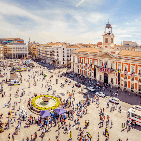 Stay just a twelve-minute walk away from Plaza Mayor