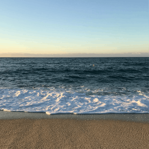 Head to Puerto Pollensa Beach for the morning, just a ten-minute drive away