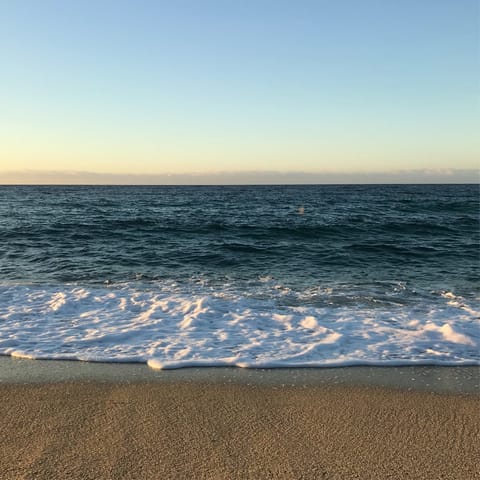 Head to Puerto Pollensa Beach for the morning, just a ten-minute drive away