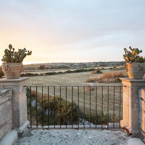 Watch the sunset across the horizon from the atmospheric terrace