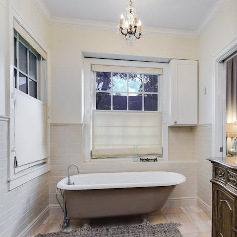 Relax after a long day of sightseeing with a soak in the clawfoot tub