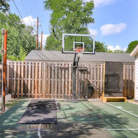 Shoot some hoops on the basketball court and practice your three-pointers