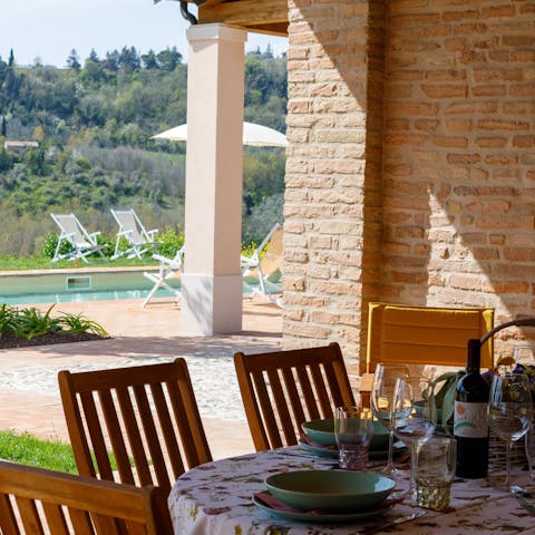 Tuck into alfresco feasts out by the pool