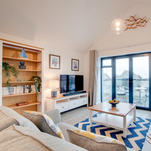 Lounge in the luxurious living space and catch up on your favourite series