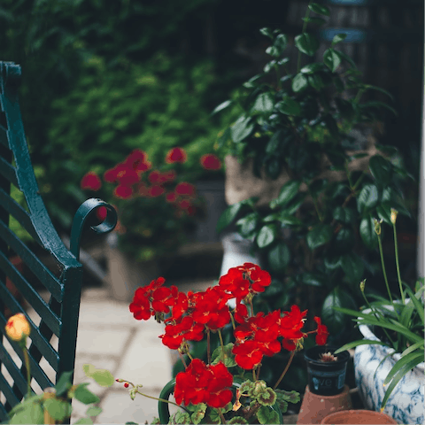Relax and enjoy alfresco meals in the private garden