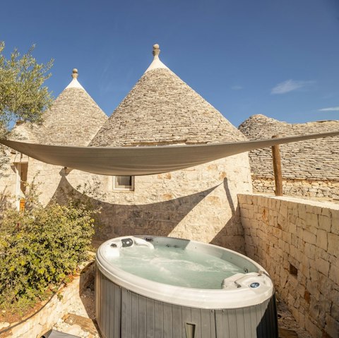 Soak in the hot tub on a cool evening
