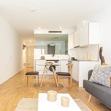 Tuck into a meal prepared by a private chef in the sleek dining area