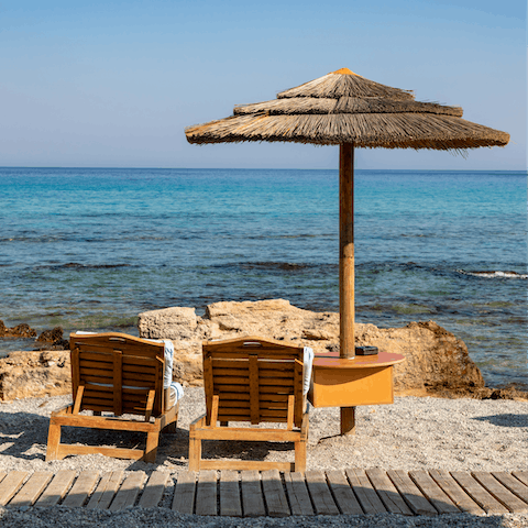 Spend leisurely days at Kalathos Beach, 400 metres from your doorstep