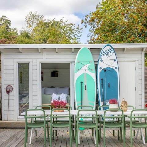 Take the free stand-up paddleboards out on the water