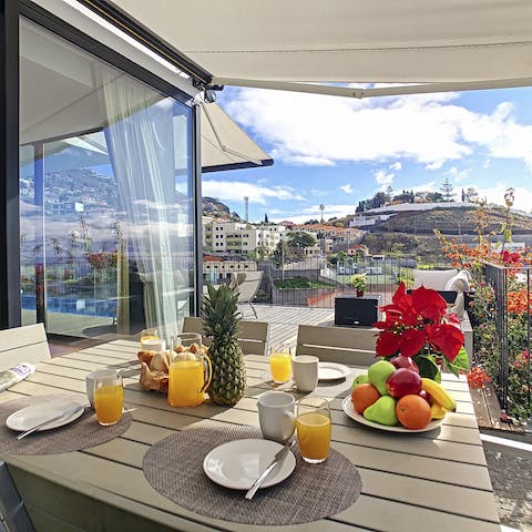 Enjoy an al fresco meal on the balcony
