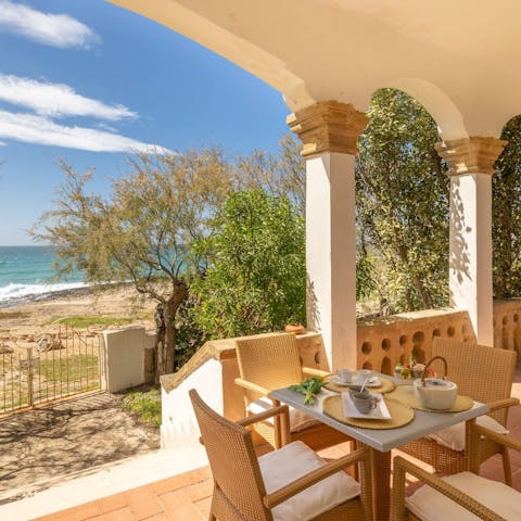 Listen to the waves crash as you dine alfresco on the terrace