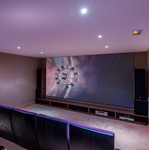 Make some popcorn then head to the cinema room for a family movie night