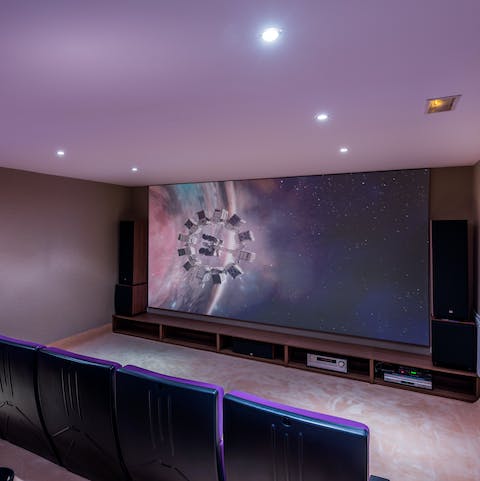 Make some popcorn then head to the cinema room for a family movie night