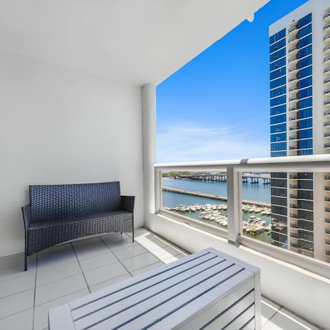 Enjoy drinks on the private balcony