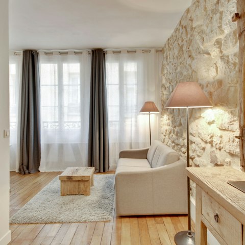 Relax with a glass of French wine after a busy day in the City of Light