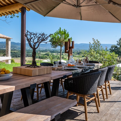 Admire views of the Provençal countryside as you dine alfresco