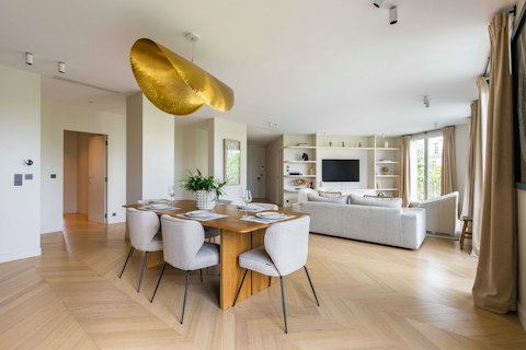 Share meals together across this airy open-plan living space