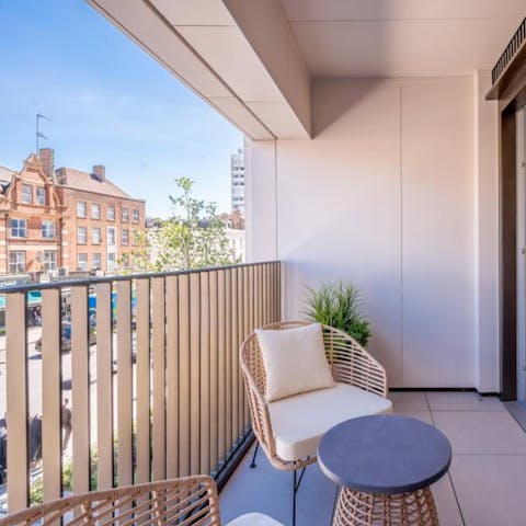 Sip your morning coffee on the private balcony as London wakes below