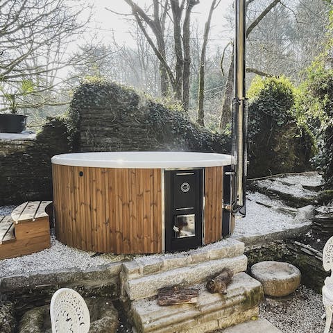 Ease yourself into the hot tub and let the stress melt away