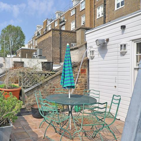 Step outside onto the patio to enjoy your morning coffee in the fresh air