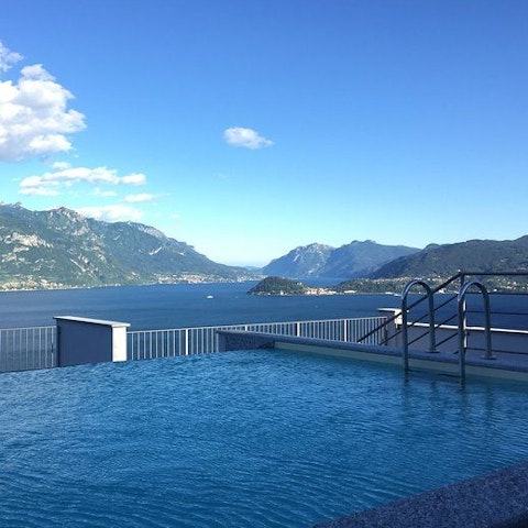 Take a refreshing dip in the shared rooftop pool