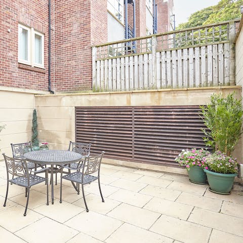 Dine alfresco on a balmy, summer evening on the private patio