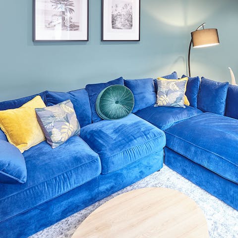 Sink into the incredibly plush, blue-velvet sofa in the lounge