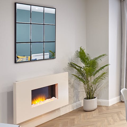 Light up the modern fireplace and relax by the hearth with a cup of Earl Grey