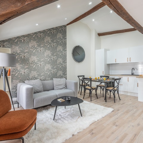 Enjoy a glass of Champagne in the loft-like living space
