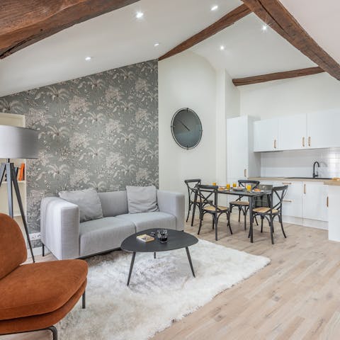 Enjoy a glass of Champagne in the loft-like living space
