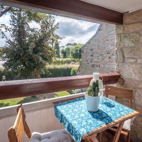 Take your morning café au lait out to your private balcony
