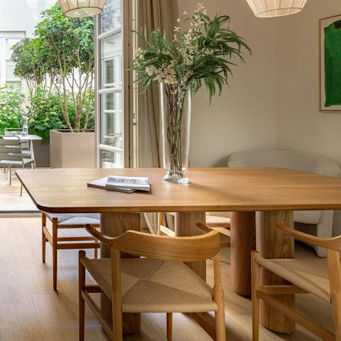 Enjoy a meal overlooking the small private garden