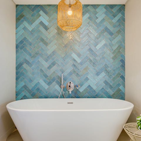 Up your relaxation with a long soak in the freestanding tub